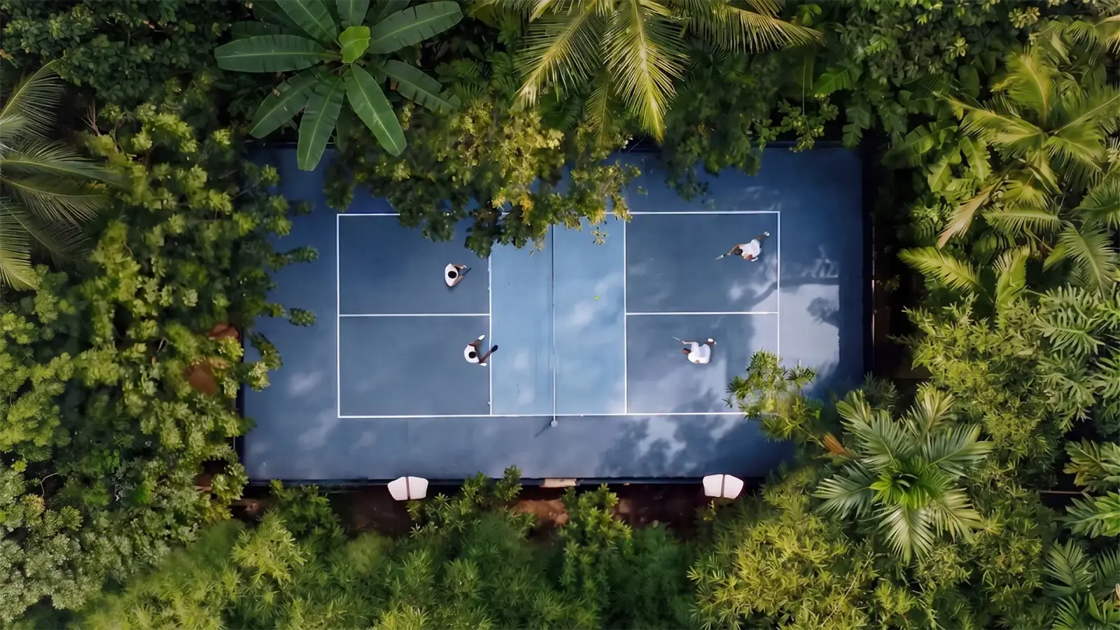 Aerial view of Bali Pickleball courts surrounded by Amed jungle